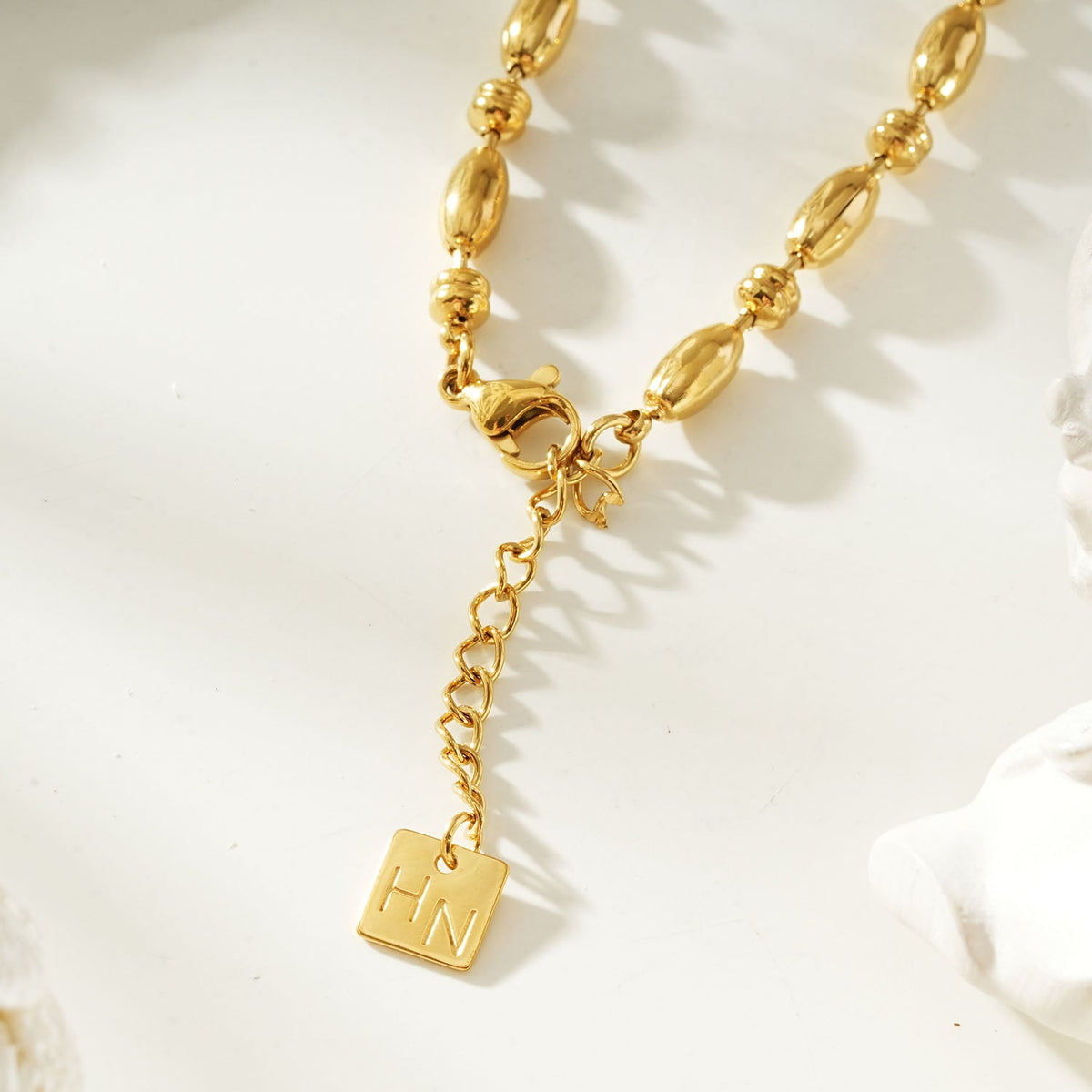 ADIATA Gold: Polished Oval Bead Bracelet – Sculpted Statement Jewellery