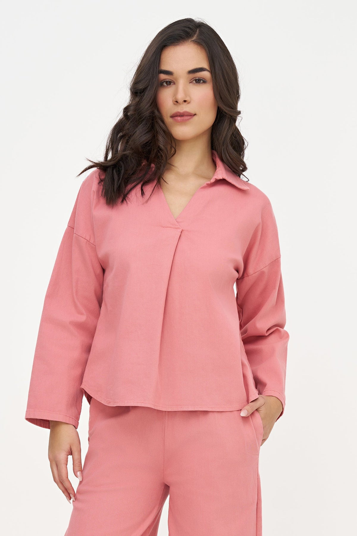 Women's Woven Long Sleeve Tunic, with a V-Neck Front & Shirt Collar. As Well As a High-Low Scooped Hemline