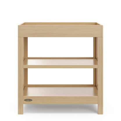 Graco Teddi Changing Table with Water-Resistant Changing Pad (Driftwood) - GREENGUARD Gold Certified, 2 Open Shelves, Includes Bonus Water-Resistant Changing Pad with Safety Strap 🍁 All In One Marketplace Canada