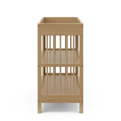 Graco Teddi Changing Table with Water-Resistant Changing Pad (Driftwood) - GREENGUARD Gold Certified, 2 Open Shelves, Includes Bonus Water-Resistant Changing Pad with Safety Strap 🍁 All In One Marketplace Canada