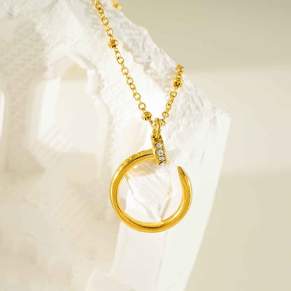 CSENGE Gold Necklace:  Zirconia Embedded Circular Nail Pendant on a Satellite Beaded Chain
