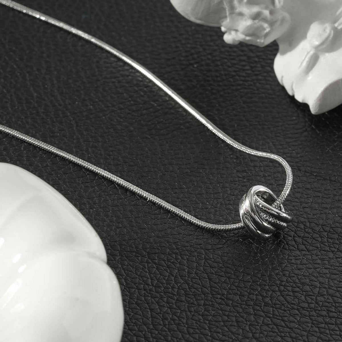 ALEKI Silver (White Gold): Sculptural Knot Pendant Necklace