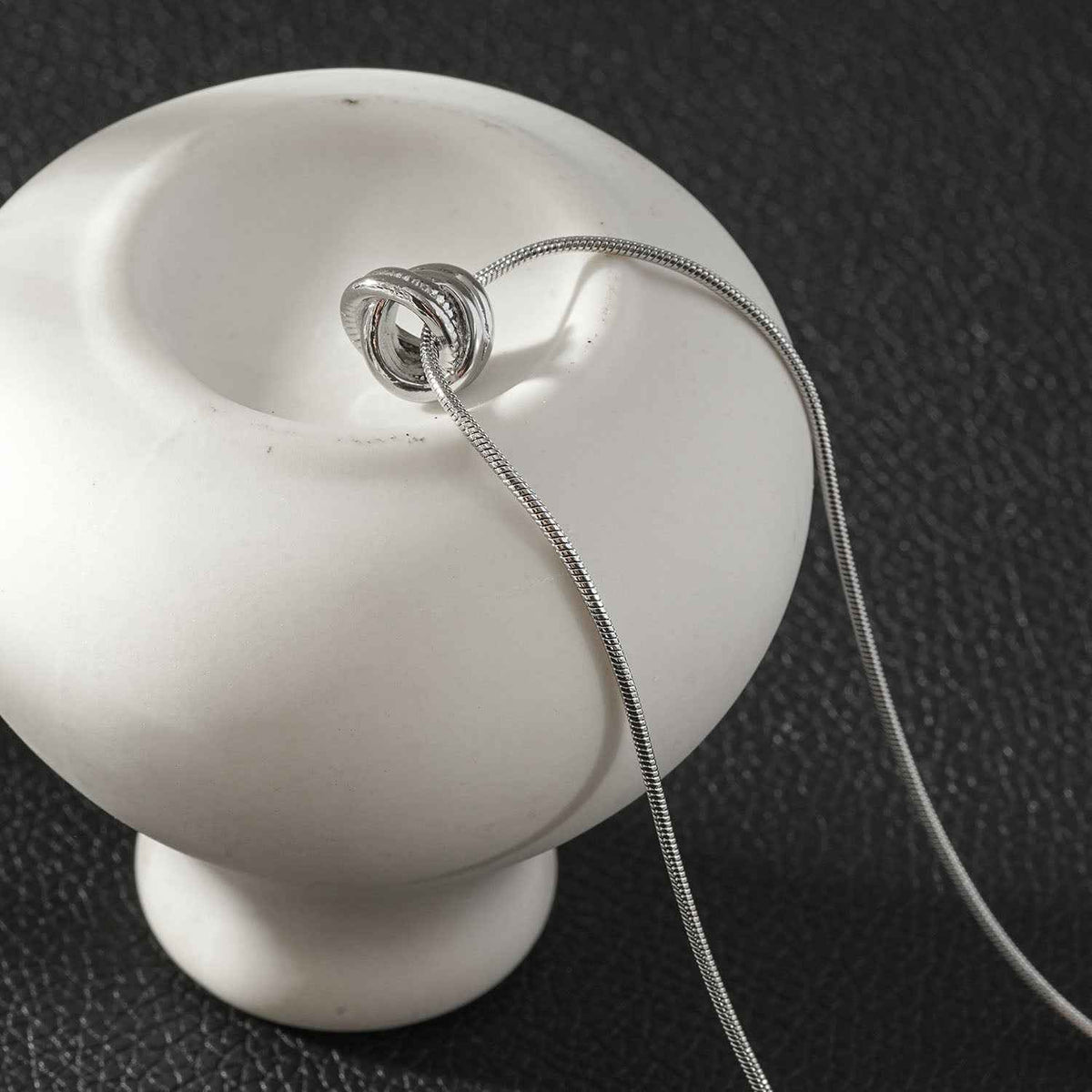 ALEKI Silver (White Gold): Sculptural Knot Pendant Necklace