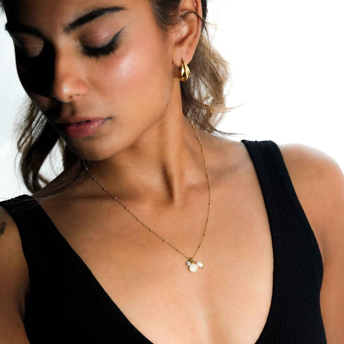KAAMIL Gold: Retro Art Deco Charms Necklace with a Beaded Chain