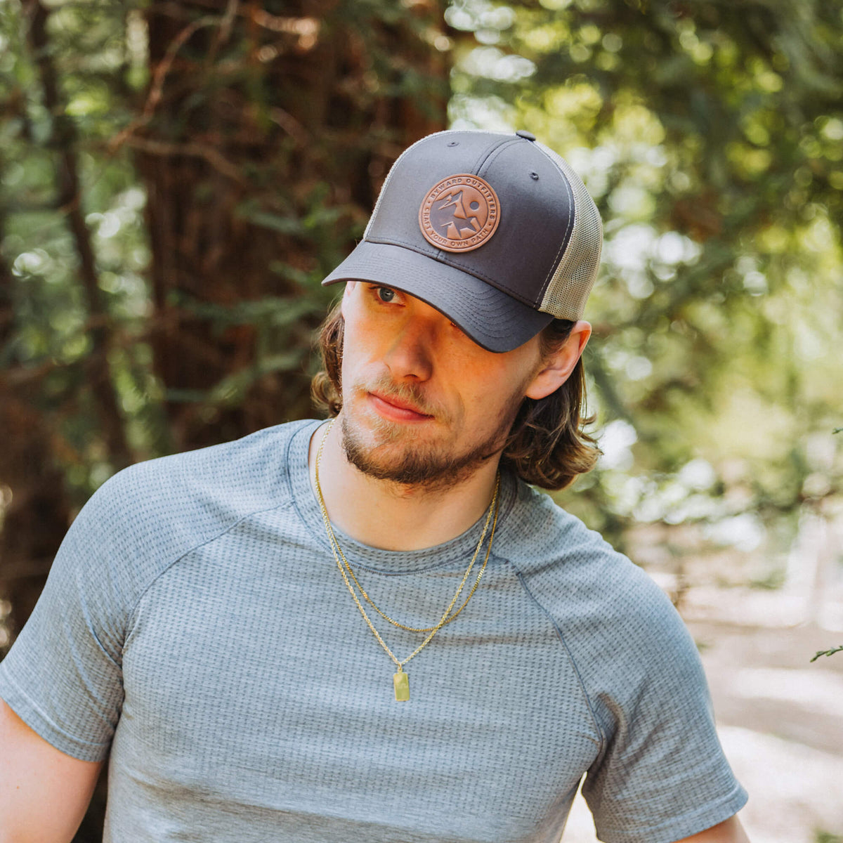 Mountain Escape Leather Patch Trucker Hat
