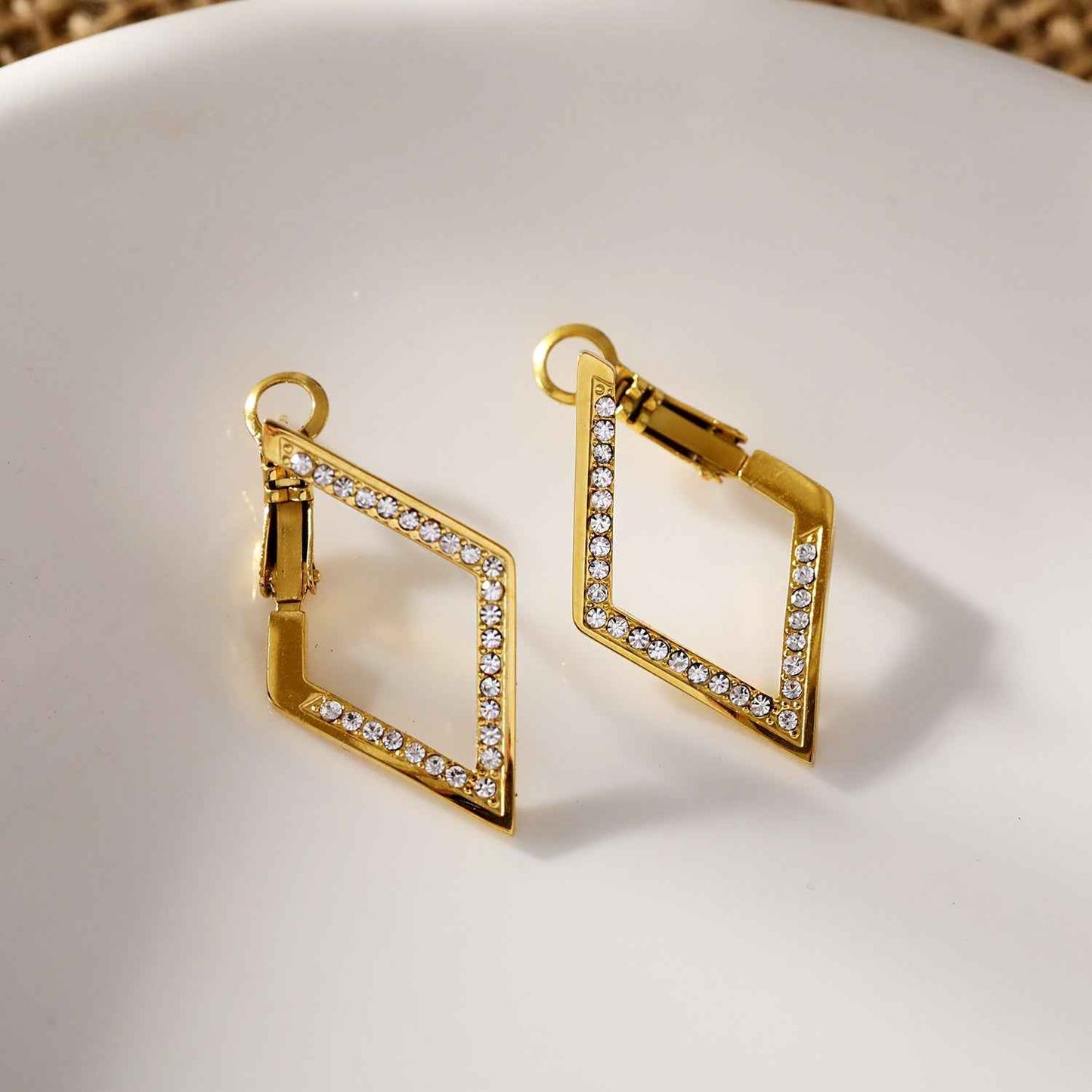 ALMA: Twisted Diamond Shaped Hoop Earrings Embedded with Zirconia Gemstones