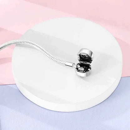 Sterling Silver Snake Chain Bracelet with Rose CZ Clasp